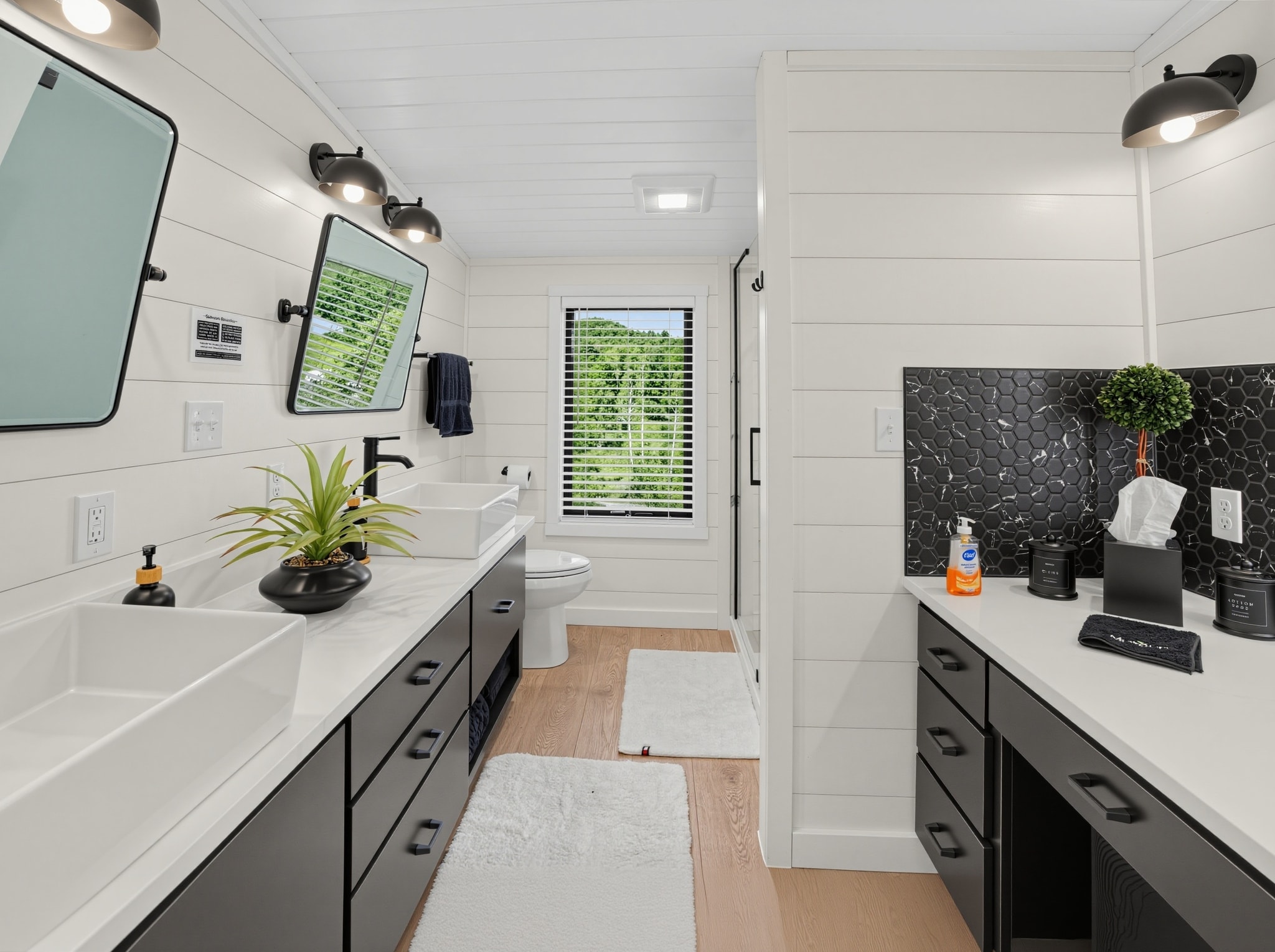 Bathroom with marble shower enclosure