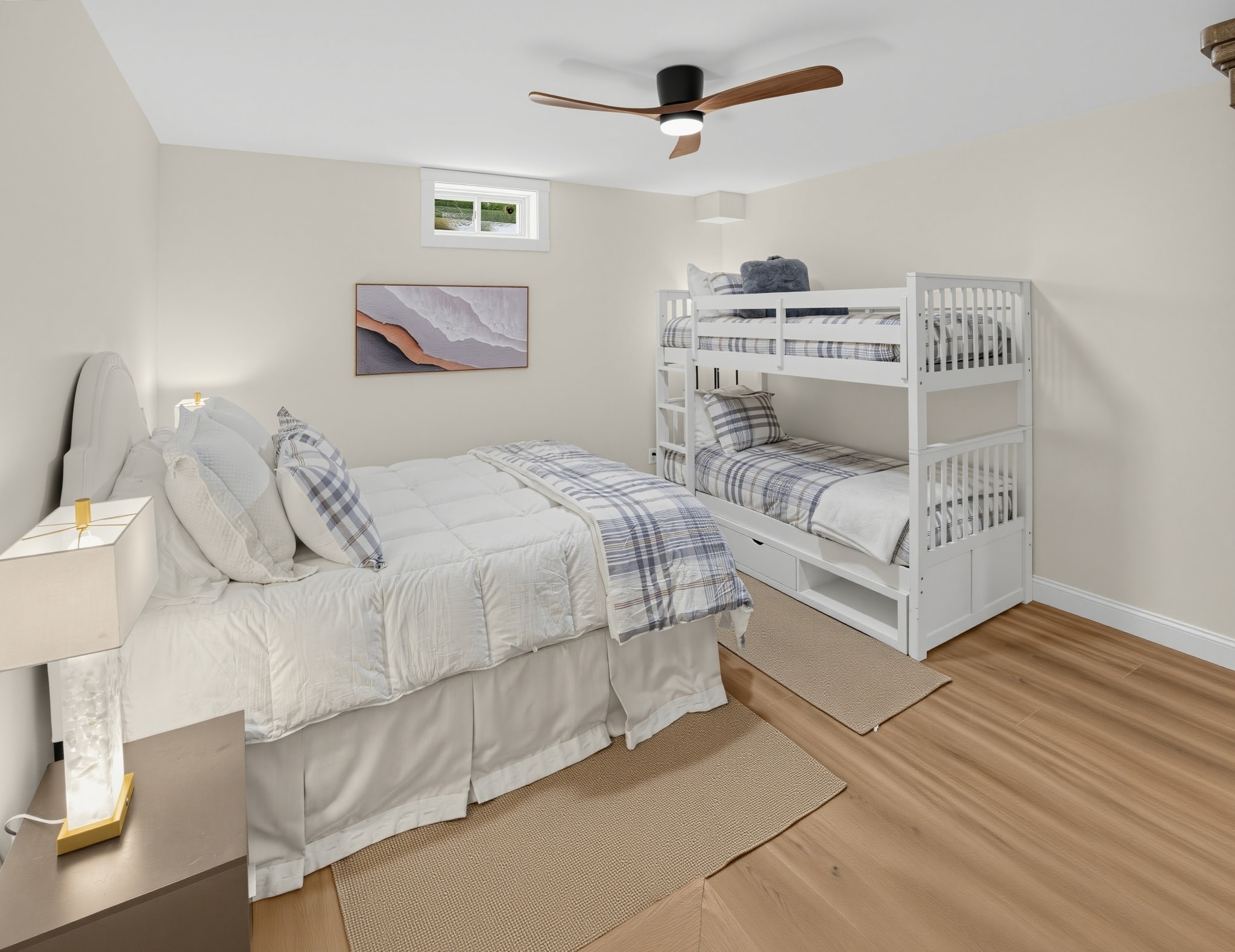 Guest bedroom with queen bed and bunk beds