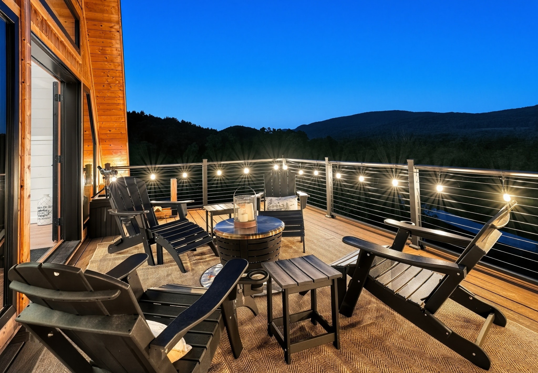 Illuminated deck with mountain views