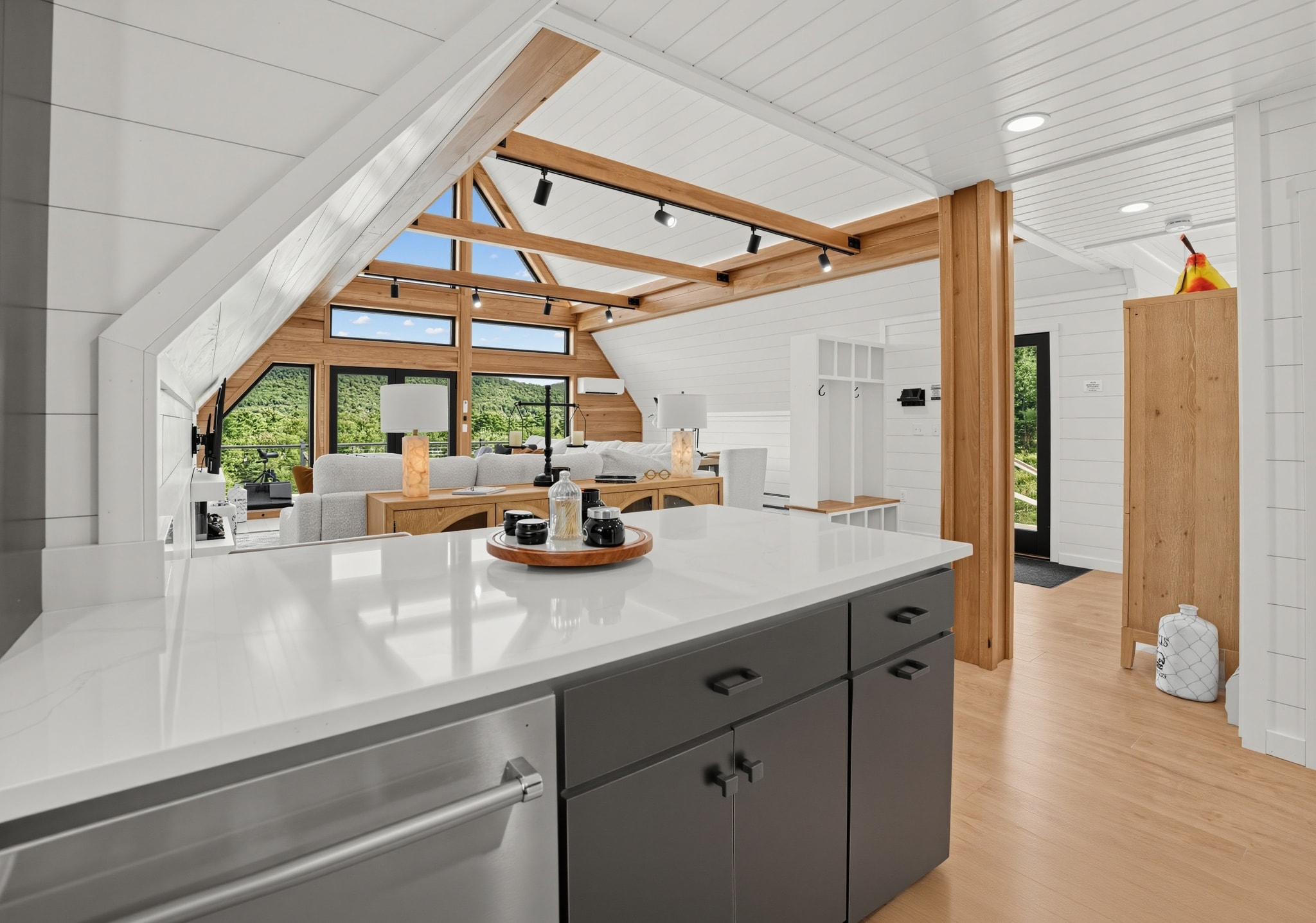 Open concept kitchen with wood beams